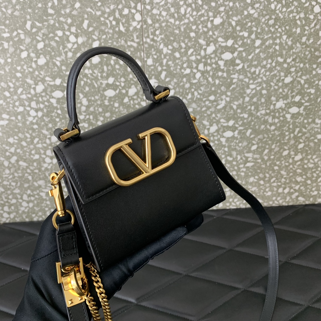 Valentino Garavani Vsling Micro Handbag in Black Grainy Calfskin Leather 